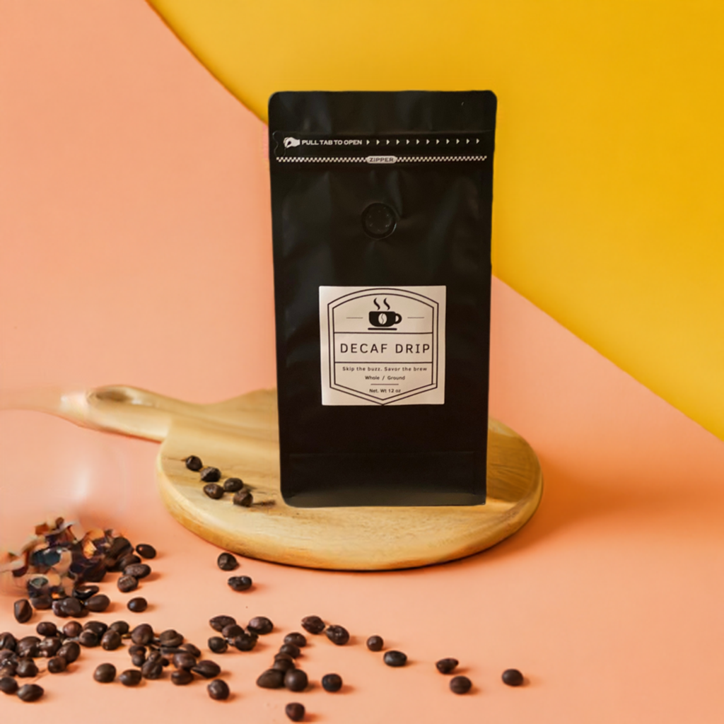 A package of coffee beans with the label 'Mellow Mornings' on a table, with scattered beans and a plant backdrop.